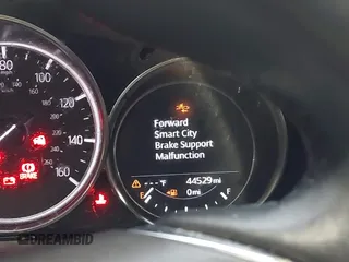 2018 Mazda CX-9 Sport z VIN JM3TCABY6J0212634, wystawiony jako IAAI lot #41187204 z przebiegiem 44 529 mil mil oraz . Historia ofert i sprzedaży dostępna na DreamBid. Obrazek 15.