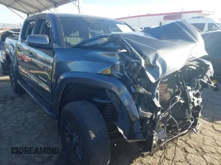 2020 Toyota Tacoma SR5 with VIN 3TMAZ5CN6LM139744, listed as a IAAI auction lot 41690662 with 68,053 mi miles and . Bid and sale history available at DreamBid. Image 1.