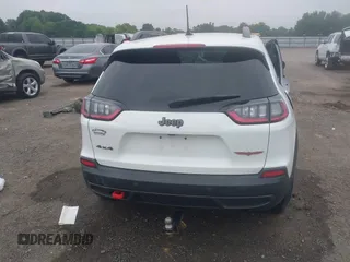 2021 Jeep Cherokee Trailhawk with VIN 1C4PJMBX4MD239112, listed as a IAAI auction lot 42271040 with 62,917 mi miles and . Bid and sale history available at DreamBid. Image 17.