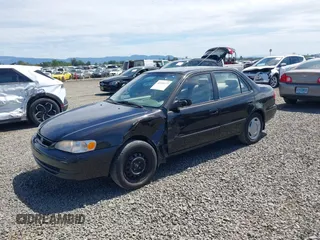 1999 Toyota Corolla VE z VIN 1NXBR12E9XZ205120, wystawiony jako IAAI lot #42216177 z przebiegiem 175 508 mil mil oraz . Historia ofert i sprzedaży dostępna na DreamBid. Obrazek 17.