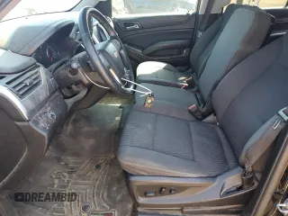 2019 Chevrolet Suburban LS with VIN 1GNSCGECXKR208615, listed as a Copart auction lot 52187105 with 174,105 mi miles and Salvage title. Bid and sale history available at DreamBid. Image 7.