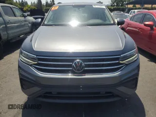 2022 Volkswagen Tiguan S with VIN 3VV1B7AX2NM047135, listed as a Copart auction lot 60137665 with 27,625 mi miles and Salvage title. Bid and sale history available at DreamBid. Image 5.