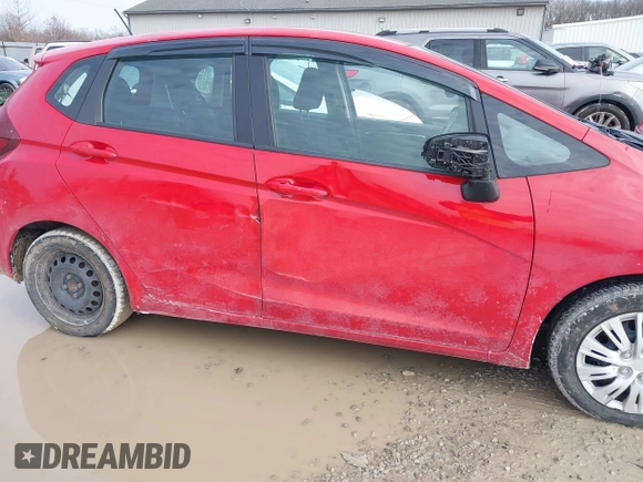 2015 Honda Fit LX z VIN 3HGGK5H54FM728448, wystawiony jako IAAI lot #41538650 z przebiegiem 115 450 mil mil oraz . Historia ofert i sprzedaży dostępna na DreamBid. Obrazek 6.