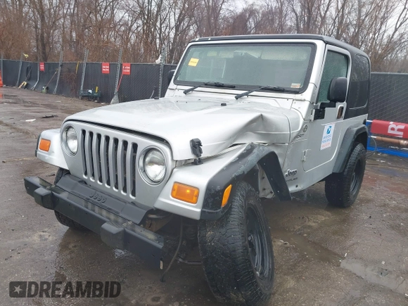2006 Jeep Wrangler Sport Right Hand Drive with VIN 1J4F449SX6P764491, listed as a IAAI auction lot 41709726 with 290,798 mi miles. Bid and sale history available at carsss.com. Image 17.
