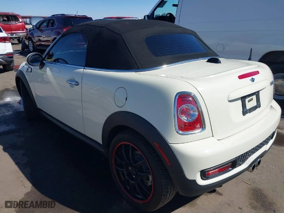 2015 MINI Cooper Roadster S with VIN WMWSY3C51FT595455, listed as a IAAI auction lot 41670221 with NaN miles. Bid and sale history available at carsss.com. Image 3.