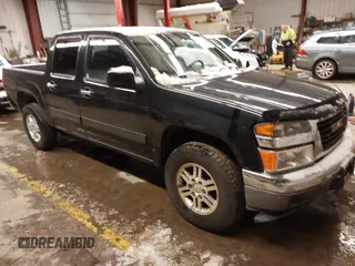 2009 GMC Canyon SLE1 with VIN 1GTDT13E698103718, listed as a IAAI auction lot 41581701 with 129,766 mi miles. Bid and sale history available at carsss.com. Image 1.