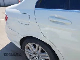 2009 Mercedes-Benz C-Class 3.0L Sport with VIN WDDGF54X09F233877, listed as a IAAI auction lot 42121123 with 215,698 mi miles. Bid and sale history available at carsss.com. Image 11.