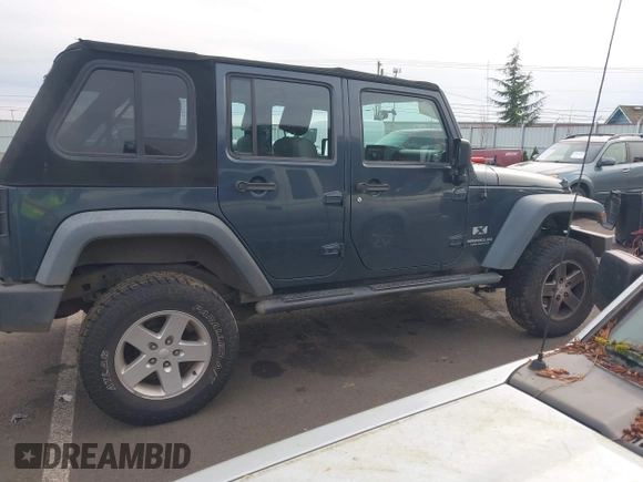 2008 Jeep Wrangler Unlimited X with VIN 1J4GB39138L518050, listed as a IAAI auction lot 41609541 with 226,752 mi miles and . Bid and sale history available at DreamBid. Image 13.