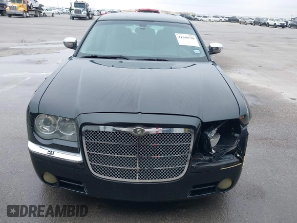 2005 Chrysler 300 with VIN 2C3AA63H45H674987, listed as a IAAI auction lot 41560730 with 101,659 mi miles. Bid and sale history available at carsss.com. Image 6.