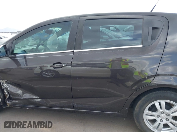 2014 Chevrolet Sonic LT with VIN 1G1JC6SHXE4135948, listed as a IAAI auction lot 41949833 with 127,202 mi miles. Bid and sale history available at carsss.com. Image 15.