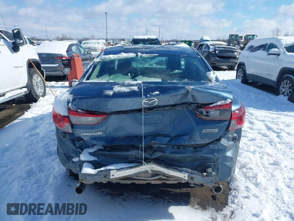 2016 Mazda 6 i Sport with VIN JM1GJ1U5XG1416911, listed as a IAAI auction lot 41562190 with 101,427 mi miles and . Bid and sale history available at DreamBid. Image 17.