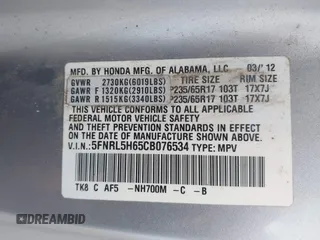2012 Honda Odyssey EX-L with VIN 5FNRL5H65CB076534, listed as a IAAI auction lot 42440258 with 150,866 mi miles and . Bid and sale history available at DreamBid. Image 9.