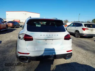 2016 Porsche Cayenne z VIN WP1AA2A2XGKA09945, wystawiony jako IAAI lot #41645654 z przebiegiem 79 327 mil mil oraz . Historia ofert i sprzedaży dostępna na DreamBid. Obrazek 6.