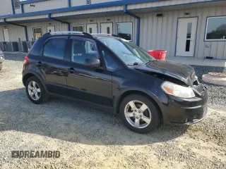 2010 Suzuki SX4 Touring with VIN JS2YB5A70A6300518, listed as a Copart auction lot 45526315 with 161,090 mi miles and Salvage Title. Bid and sale history available at carsss.com. Image 4.