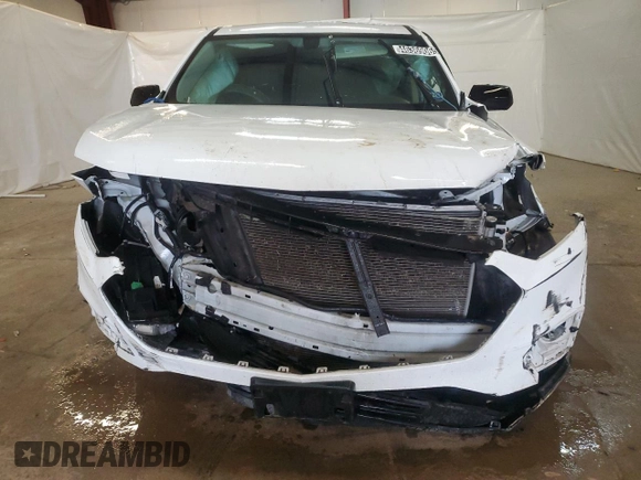 2021 Chevrolet Traverse LS with VIN 1GNERFKW6MJ248938, listed as a Copart auction lot 61857745 with 68,734 mi miles and Clean title. Bid and sale history available at DreamBid. Image 5.