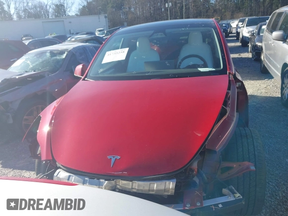 2023 Tesla Model Y Long Range with VIN 7SAYGDEE0PA202150, listed as a IAAI auction lot 41735258 with 22,131 mi miles and . Bid and sale history available at DreamBid. Image 12.