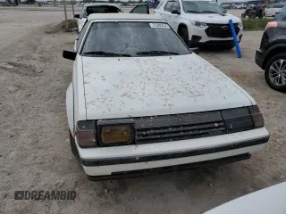 1985 Toyota Celica GTS z VIN JT5RA65K1F4055412, wystawiony jako Copart lot #75390434 z przebiegiem 97 017 mil mil oraz Szkoda całkowita • Salvage title. Historia ofert i sprzedaży dostępna na DreamBid. Obrazek 5.