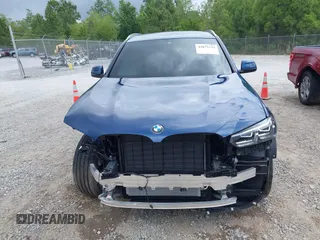 2024 BMW X3 sDrive30i z VIN 5UX43DP00R9U75600, wystawiony jako IAAI lot #42072731 z przebiegiem Nie podano mil oraz . Historia ofert i sprzedaży dostępna na DreamBid. Obrazek 13.