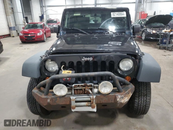 2009 Jeep Wrangler Rubicon with VIN 1J4GA64159L770895, listed as a Copart auction lot 82140864 with 209,464 mi miles and Salvage Title. Bid and sale history available at DreamBid. Image 5.