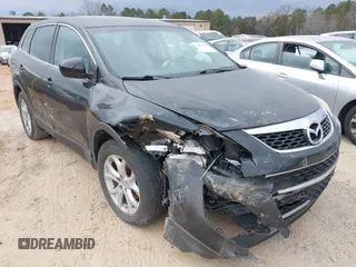 2011 Mazda CX-9 Sport with VIN JM3TB2BA1B0312296, listed as a IAAI auction lot 41476182 with 210,473 mi miles and . Bid and sale history available at DreamBid. Image 1.