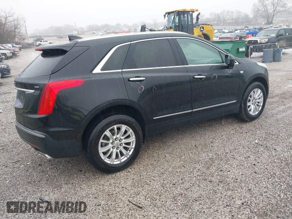 2018 Cadillac XT5 FWD with VIN 1GYKNARS6JZ160993, listed as a IAAI auction lot 41472847 with 113,415 mi miles. Bid and sale history available at carsss.com. Image 4.