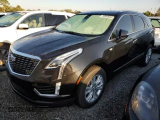 2022 Cadillac XT5 FWD Luxury z VIN 1GYKNAR47NZ100986, wystawiony jako Copart lot #74203834 z przebiegiem Nie podano mil oraz Nie do naprawy • Non repairable. Historia ofert i sprzedaży dostępna na DreamBid. Obrazek 1.