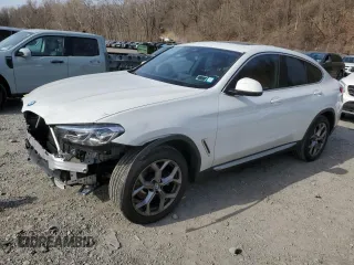 2024 BMW X4 xDrive30i z VIN 5UX33DT09R9U71062, wystawiony jako Copart lot #52200375 z przebiegiem 21 979 mil mil oraz Szkody całkowita. Historia ofert i sprzedaży dostępna na DreamBid. Obrazek 1.