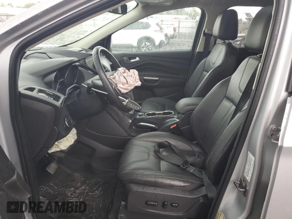 2013 Ford Escape Titanium with VIN 1FMCU9J94DUB00695, listed as a Copart auction lot 56633955 with 129,011 mi miles and Salvage title. Bid and sale history available at DreamBid. Image 7.