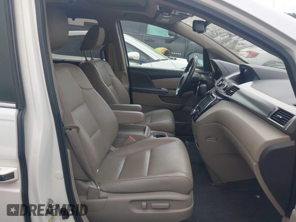 2016 Honda Odyssey EX-L with VIN 5FNRL5H67GB143253, listed as a IAAI auction lot 41952043 with 209,153 mi miles and . Bid and sale history available at DreamBid. Image 5.