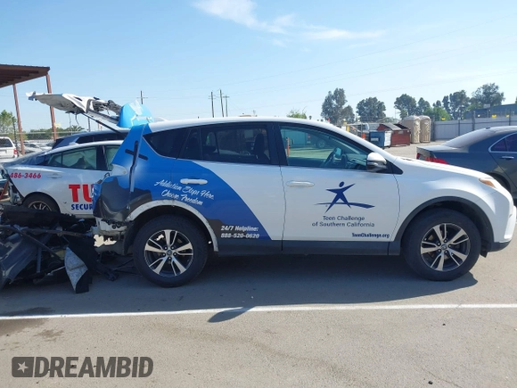 2018 Toyota RAV4 XLE with VIN 2T3WFREV7JW480326, listed as a IAAI auction lot 42021965 with 174,347 mi miles. Bid and sale history available at carsss.com. Image 14.
