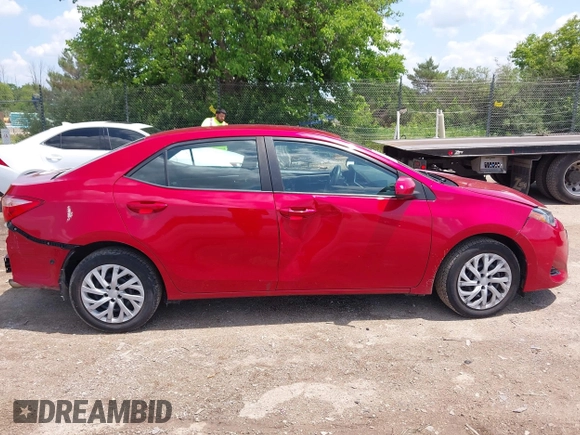 2018 Toyota Corolla L with VIN 2T1BURHE7JC105479, listed as a IAAI auction lot 42540566 with 67,487 mi miles and . Bid and sale history available at DreamBid. Image 13.