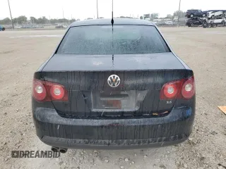 2009 Volkswagen Jetta S z VIN 3VWJM71K49M094862, wystawiony jako Copart lot #51166725 z przebiegiem 121 849 mil mil oraz Szkoda całkowita • Salvage title. Historia ofert i sprzedaży dostępna na DreamBid. Obrazek 6.