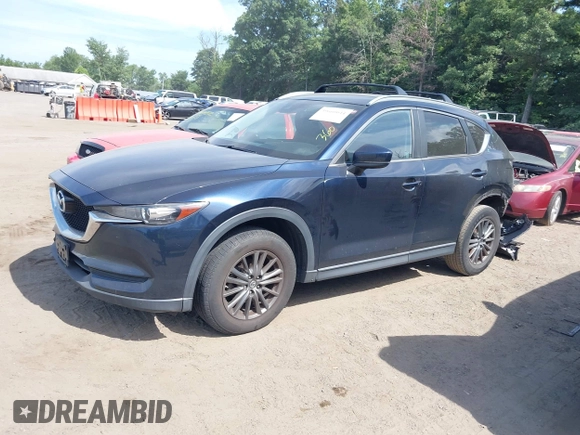 2017 Mazda CX-5 Touring z VIN JM3KFBCL5H0133493, wystawiony jako IAAI lot #39666644 z przebiegiem 125 048 mil mil oraz . Historia ofert i sprzedaży dostępna na DreamBid. Obrazek 18.