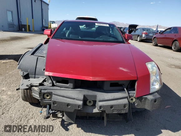 2004 Cadillac XLR z VIN 1G6YV34A345600127, wystawiony jako Copart lot #68859774 z przebiegiem 40 727 mil mil oraz Szkody całkowita. Historia ofert i sprzedaży dostępna na DreamBid. Obrazek 5.