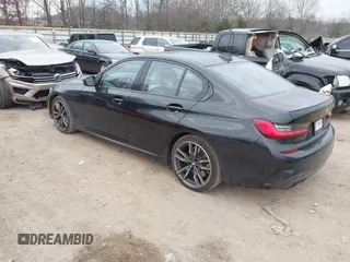 2020 BMW 3 Series M340i with VIN WBA5U7C02LAF54184, listed as a IAAI auction lot 41490697 with 57,363 mi miles. Bid and sale history available at carsss.com. Image 3.