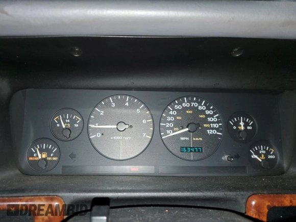 1996 Jeep Grand Cherokee Laredo with VIN 1J4GZ58S0TC402024, listed as a Copart auction lot 65074774 with 163,477 mi miles and Salvage Title. Bid and sale history available at carsss.com. Image 9.