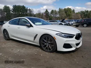 2020 BMW 8 Series M850i z VIN WBAGV8C01LBP48692, wystawiony jako Copart lot #52019305 z przebiegiem Nie podano mil oraz Szkody całkowita. Historia ofert i sprzedaży dostępna na DreamBid. Obrazek 4.