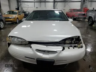 1997 Ford Thunderbird LX with VIN 1FALP6249VH167869, listed as a Copart auction lot 86851434 with 40,490 mi miles and Salvage Title. Bid and sale history available at DreamBid. Image 5.