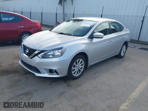 2018 Nissan Sentra S with VIN 3N1AB7AP6JY348026, listed as a IAAI auction lot 42014856 with 44,958 mi miles and . Bid and sale history available at DreamBid. Image 2.
