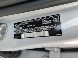2023 Polestar 2 z VIN YSMED3KA1PL144560, wystawiony jako Copart lot #77189294 z przebiegiem 34 504 mil mil oraz Czysty tytuł • Clean title. Historia ofert i sprzedaży dostępna na DreamBid. Obrazek 12.