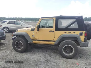 2013 Jeep Wrangler Sport with VIN 1C4AJWAG1DL672816, listed as a IAAI auction lot 42597238 with 105,910 mi miles and . Bid and sale history available at DreamBid. Image 14.
