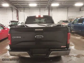 2015 Ford F-150 XLT w/HD Payload Pkg with VIN 1FTFW1EG8FFB59391, listed as a IAAI auction lot 41520010 with 119,414 mi miles. Bid and sale history available at carsss.com. Image 16.