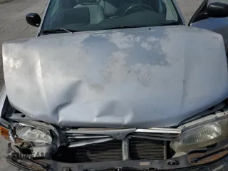 2000 Mitsubishi Mirage DE z VIN JA3AY26C0YU025395, wystawiony jako Copart lot #58173025 z przebiegiem 129 545 mil mil oraz Szkoda całkowita • Salvage title. Historia ofert i sprzedaży dostępna na DreamBid. Obrazek 11.