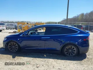 2017 Tesla Model X 90D z VIN 5YJXCBE26HF079022, wystawiony jako IAAI lot #41847954 z przebiegiem 74 940 mil mil oraz . Historia ofert i sprzedaży dostępna na DreamBid. Obrazek 15.