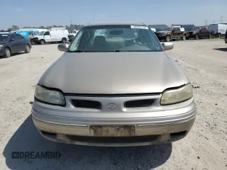 1998 Oldsmobile Cutlass GLS z VIN 1G3NG52M9W6325850, wystawiony jako Copart lot #48960705 z przebiegiem 46 509 mil mil oraz Tytuł czysty. Historia ofert i sprzedaży dostępna na DreamBid. Obrazek 5.