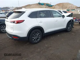 2020 Mazda CX-9 Sport with VIN JM3TCBBY6L0414673, listed as a IAAI auction lot 41310952 with 27,686 mi miles. Bid and sale history available at carsss.com. Image 4.