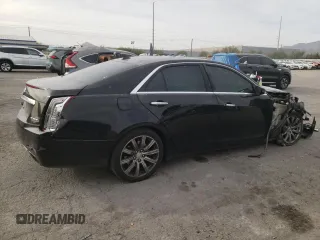 2014 Cadillac CTS Premium AWD z VIN 1G6AZ5SX7E0158072, wystawiony jako Copart lot #79503204 z przebiegiem 86 777 mil mil oraz Szkoda całkowita • Salvage title. Historia ofert i sprzedaży dostępna na DreamBid. Obrazek 3.