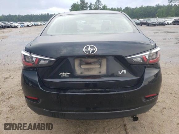 2016 Scion iA z VIN 3MYDLBZVXGY112986, wystawiony jako Copart lot #53967305 z przebiegiem 215 215 mil mil oraz Szkoda całkowita • Salvage title. Historia ofert i sprzedaży dostępna na DreamBid. Obrazek 6.