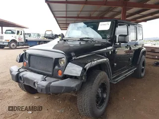 2008 Jeep Wrangler Unlimited Sahara with VIN 1J8GA59128L542384, listed as a IAAI auction lot 42184176 with 152,768 mi miles and . Bid and sale history available at DreamBid. Image 18.