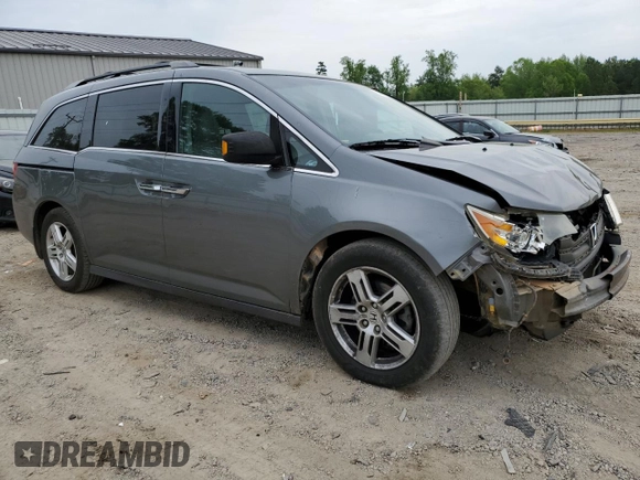 2012 Honda Odyssey Touring with VIN 5FNRL5H96CB045514, listed as a Copart auction lot 54698355 with 217,787 mi miles and Clean Title. Bid and sale history available at DreamBid. Image 4.